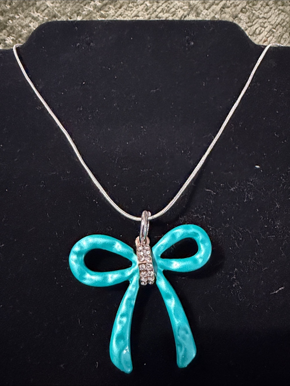 Turquoise Bow Pendant Necklace with Crystal Accent. Chain included